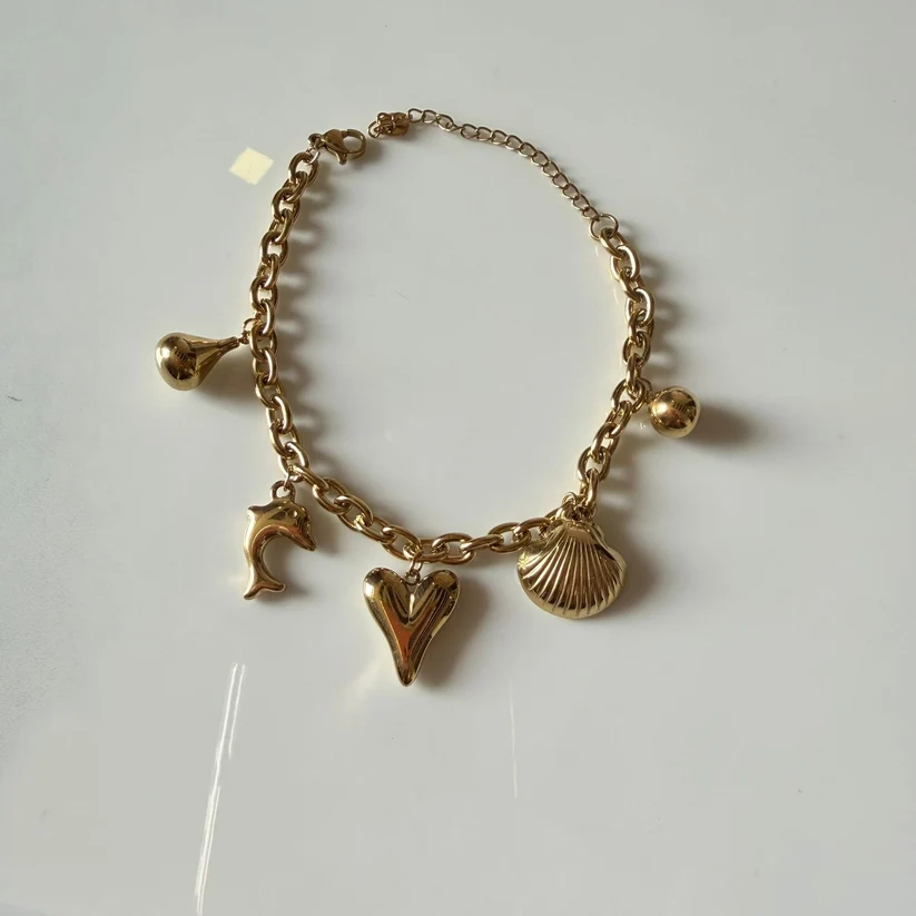 Gold Jhumka Earrings